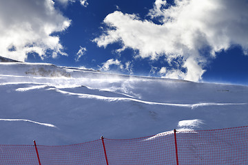 Image showing Off-piste slope during a blizzard and sunlight blue sky