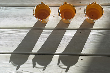 Image showing Shadows on a wooden floor.