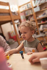 Image showing Little boy playing with toys in the room
