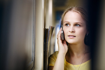 Image showing Woman talking on the phone