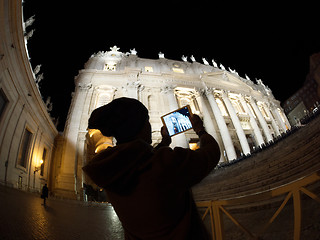 Image showing Tourist with pad shooting St. Peters Basilica in Vatican City