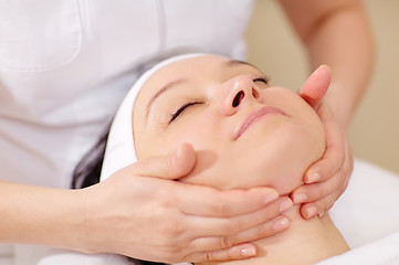 Image showing Facial massage at beauty treatment salon