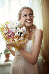 Image showing Beautiful young bride with a wedding bouquet