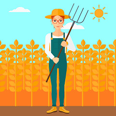 Image showing Farmer with pitchfork.