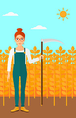 Image showing Farmer on the field with scythe.