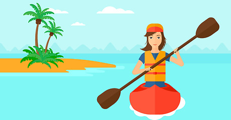 Image showing Woman riding in canoe.