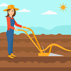 Image showing Farmer on the field with plough.