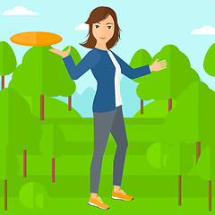 Image showing Woman playing frisbee.