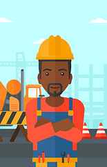 Image showing Friendly builder with arms crossed.