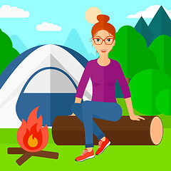 Image showing Woman sitting at camp.