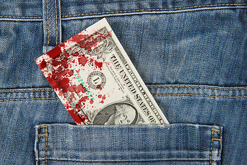 Image showing Macro shot of trendy jeans with american 1 dollar bill, blood