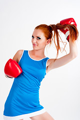 Image showing Young beautiful woman in boxing gloves