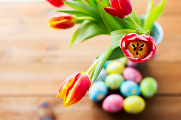 Image showing close up of easter eggs and flowers in bucket