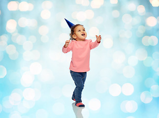 Image showing happy little baby girl with birthday party hat