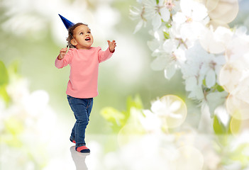 Image showing happy little baby girl with birthday party hat