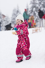 Image showing little girl at snowy winter day