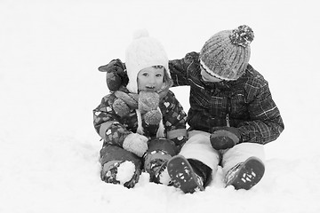 Image showing group of kids having fun and play together in fresh snow