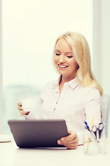 Image showing smiling businesswoman or student with tablet pc