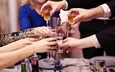 Image showing Group of people toasting at a celebration