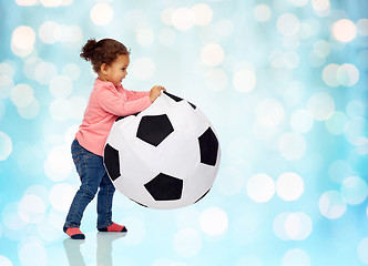 Image showing happy mulatto little baby girl playing with ball