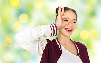 Image showing happy teenage girl making face and having fun