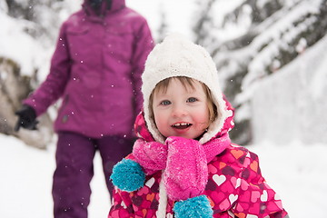 Image showing little girl at snowy winter day