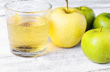 Image showing apple and glass of juice