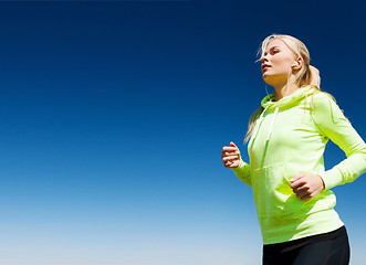 Image showing woman doing running outdoors