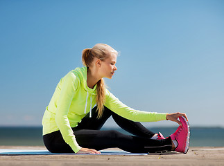 Image showing woman doing sports outdoors