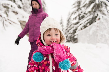 Image showing little girl at snowy winter day