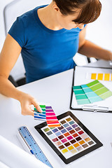 Image showing woman working with color samples for selection