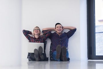 Image showing startup business, couple working on laptop computer at office