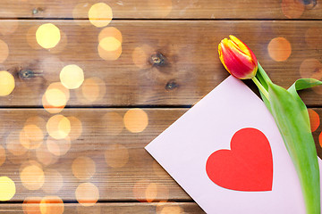 Image showing close up of flowers and greeting card with heart