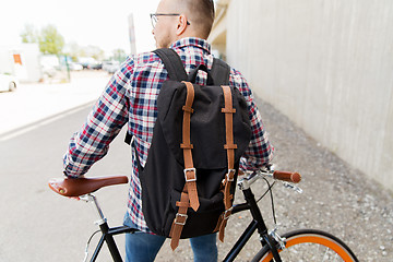 Image showing hipster man with fixed gear bike and backpack