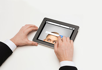 Image showing close up of hands and internet search on tablet pc