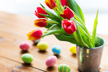 Image showing close up of easter eggs and flowers in bucket