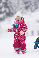 Image showing little girl at snowy winter day