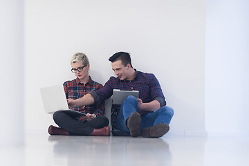 Image showing startup business, couple working on laptop computer at office