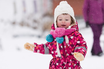 Image showing little girl at snowy winter day