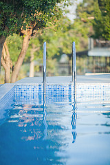 Image showing Outdoor swimming pool with shiny water