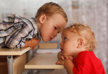 Image showing Cute siblings. Two little brothers.