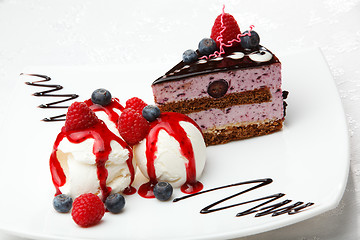 Image showing Vanilla ice cream with berries and cake