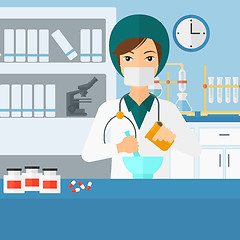 Image showing Pharmacist preparing medicine.