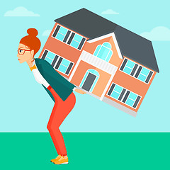 Image showing Woman carrying house.