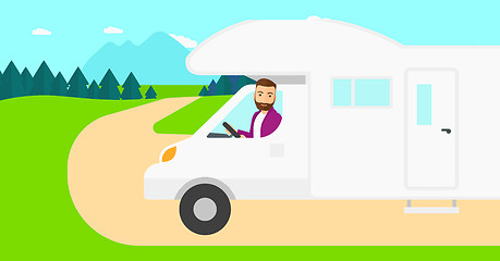 Image showing Man driving motor home.