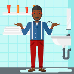 Image showing Man in despair standing near leaking sink.