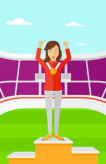 Image showing Athlete with medal and hands raised.