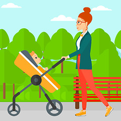 Image showing Woman pushing pram.