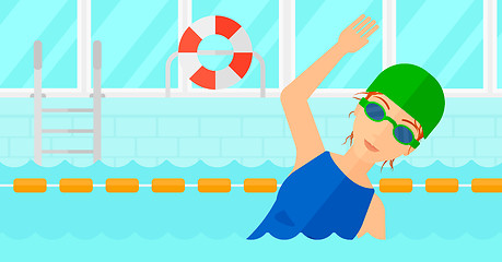 Image showing Swimmer training in pool.