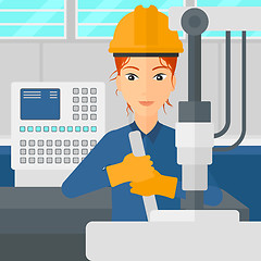 Image showing Woman working with industrial equipment.